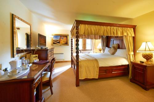 卡姆登阿姆斯酒店客房内的一张或多张床位