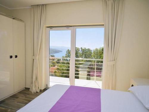 Villa Manuela - Deluxe Rooms with Sea View and Swimming pool客房内的一张或多张床位