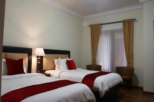 格里亚维吉兰斯亚利亚酒店客房内的一张或多张床位