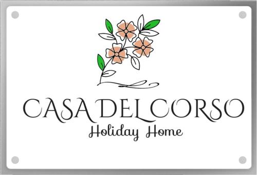 莫塔卡玛斯特拉Casa Del Corso的鲜花标志度假屋