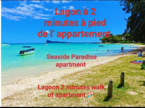 佩雷贝勒Seaside Paradise 2 minutes à pied du Lagoon的海滩上用 ⁇ 子 ⁇ 湖,一分钟一声 ⁇ 