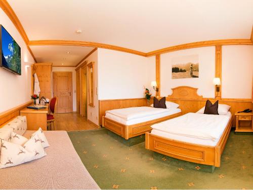 泰若乐尔霍夫高山酒店客房内的一张或多张床位