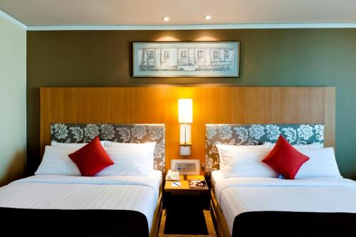 皇家公主兰朗酒店 - SHA Extra Plus客房内的一张或多张床位