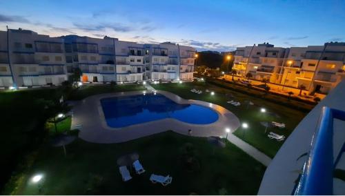 Lovely Apartment in CABO, RIVIERA BEACH内部或周边泳池景观