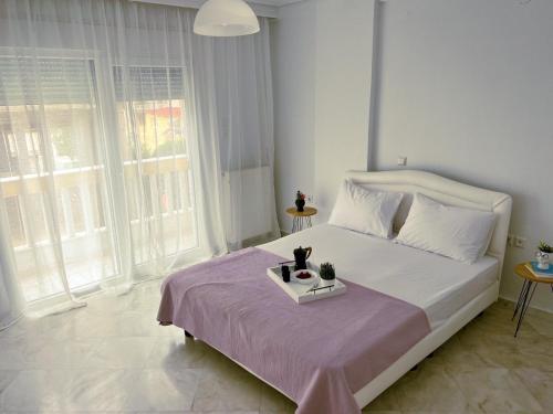 Down town villa Kavala客房内的一张或多张床位