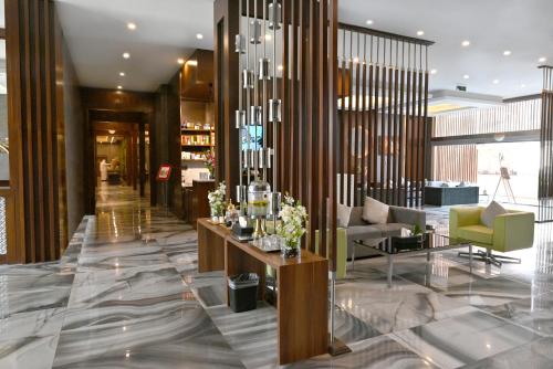 Q Suites Jeddah by EWA - Managed by HMH餐厅或其他用餐的地方