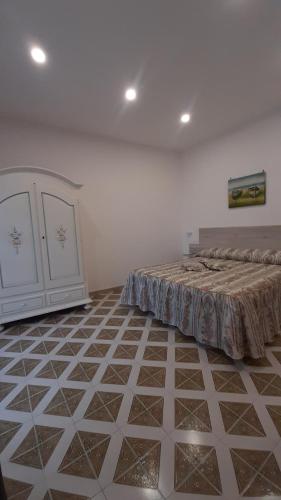 Al Geranio accomodation客房内的一张或多张床位