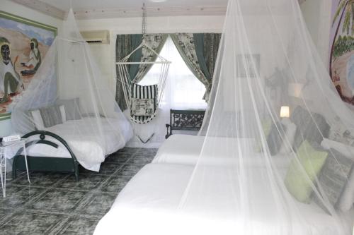 传奇花园公寓酒店客房内的一张或多张床位