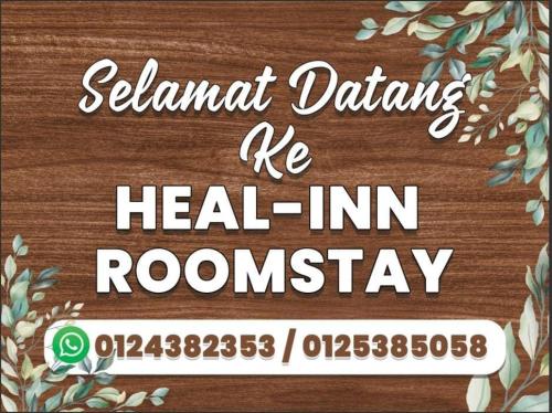 加央Heal Inn Roomstay - Islam Guest的康复旅馆路标