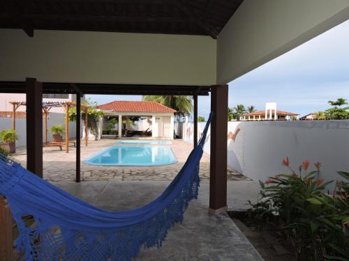 卢塞纳Casabella的一个带吊床的庭院和一个游泳池