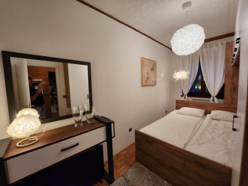 Apartments & wellness Kal Koritnica客房内的一张或多张床位