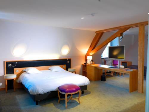 奥伯格切瓦尔布兰科温泉酒店客房内的一张或多张床位