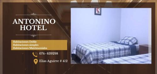 齐克拉约ANTONINO HOTEL的一张海报,为一家带两张床的奥米诺酒店