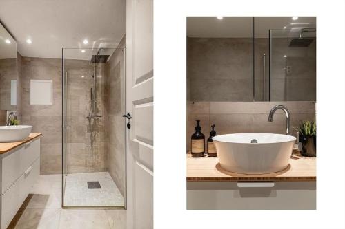 卑尔根Dinbnb Apartments I Luxury Feel 100m from Bryggen的带浴缸、淋浴和盥洗盆的浴室