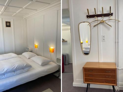 圣玛利亚瓦尔姆斯塔尔Ferienwohnung Banca Veglia的卧室两张照片,配有一张床和镜子