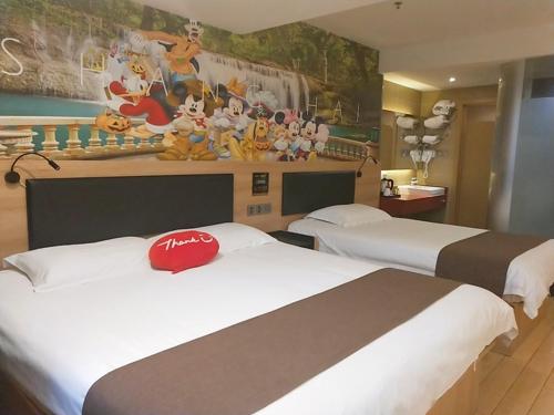 尚客优精选上海浦东新区国际旅游度假区店客房内的一张或多张床位