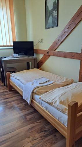 Penzion Bruder客房内的一张或多张床位