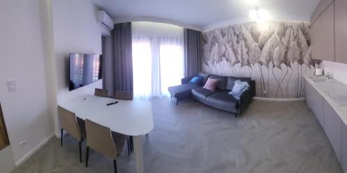 Apartamenty przy nowej plaży 1的休息区