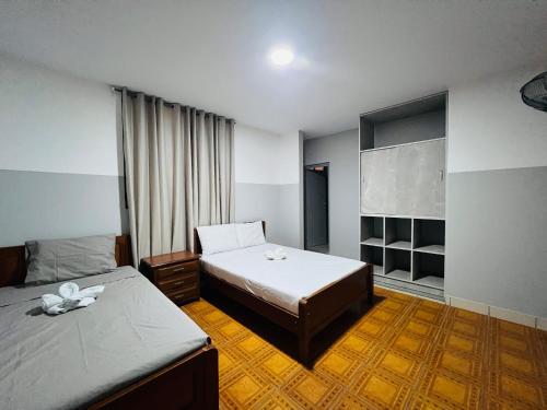 LEO DO-DO Hostal Piura客房内的一张或多张床位