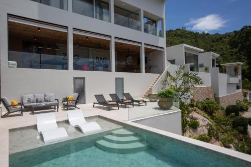 苏梅岛Zog Villas的一座带游泳池的房子的图象