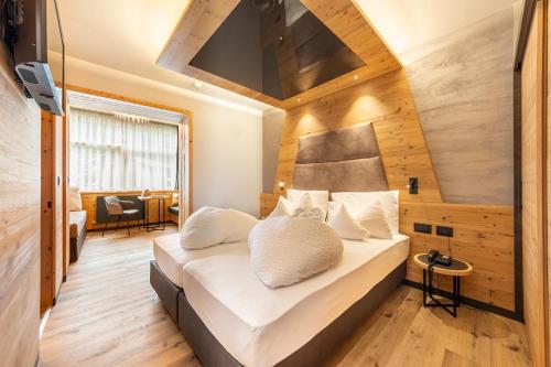 莫埃纳法罗丽亚酒店的卧室配有一张床