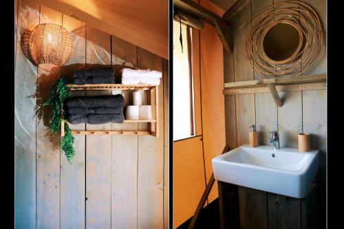 AlphenLuxury Lake Lodge的一间带水槽和镜子的浴室