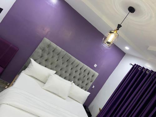 Bamod Hotel and Suites客房内的一张或多张床位