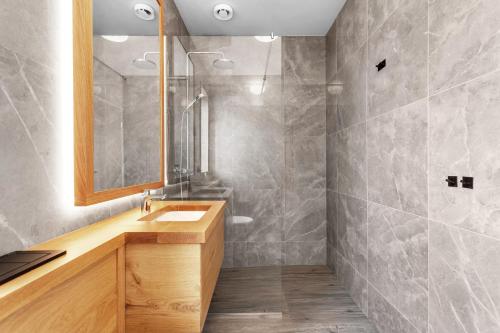 雷克霍特4bed 4bath Sauna & Hot tub的一间带水槽和镜子的浴室