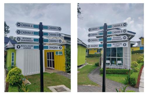 波德申Solesor Kampong Beach Resort的建筑物前的两幅街道标志图片