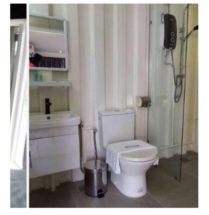 波德申Solesor Kampong Beach Resort的一间带卫生间和水槽的浴室