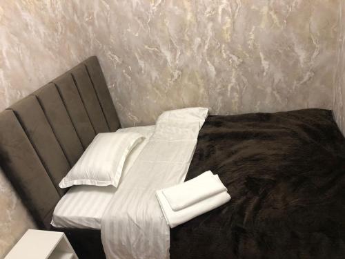 Hotel LION Almaty客房内的一张或多张床位