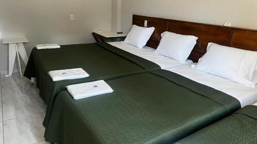 Pousada Mar & Sol客房内的一张或多张床位