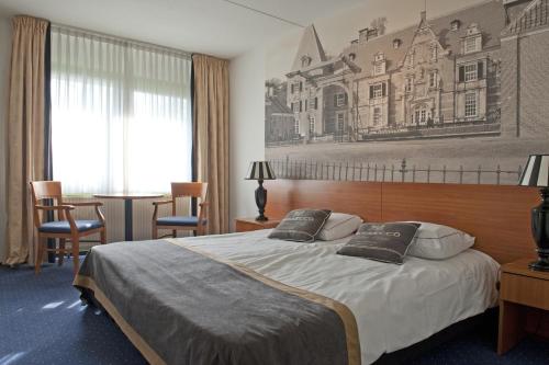 瓦蓬凡德尔登酒店客房内的一张或多张床位