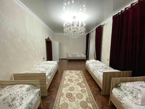 Sultan Sarai Osh客房内的一张或多张床位