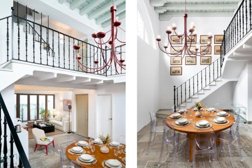 塞维利亚Magno Apartments Fabiola 7 Luxury House的一间带桌子和楼梯的用餐室