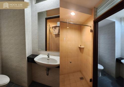古晋Hock Lee Hotel & Residences的一间带水槽和卫生间的浴室