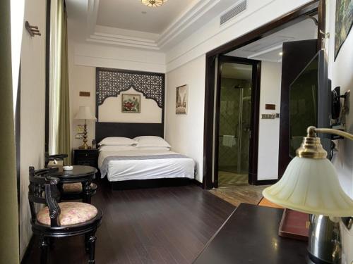 格林东方天津武清区万达广场酒店客房内的一张或多张床位