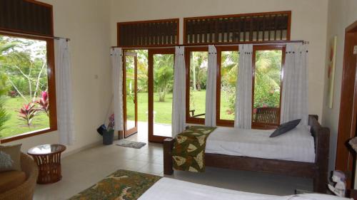 Rumah Kita Villa/hotel客房内的一张或多张床位