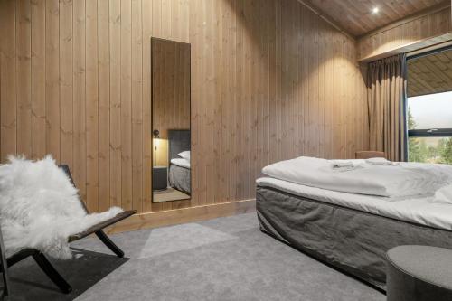 Yttersvingen Kvitfjell客房内的一张或多张床位