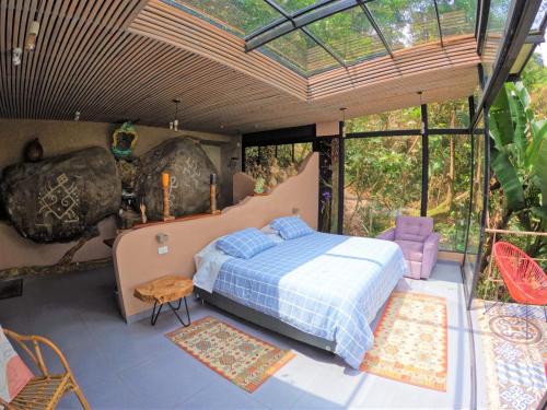 Eco Lodge Macabaña Rupestre客房内的一张或多张床位