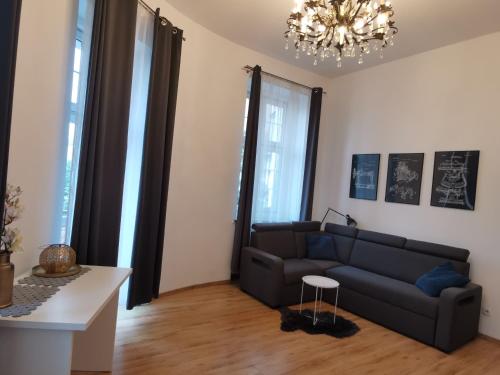 Apartament na Rynku w Gnieźnie的休息区