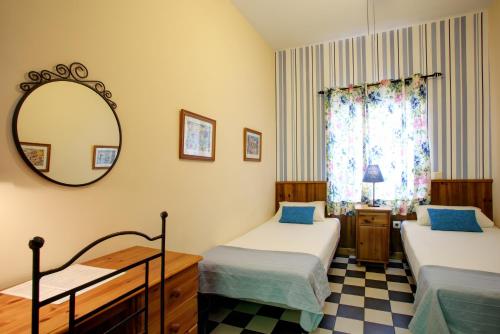 马拉加住宿加早餐旅馆客房内的一张或多张床位