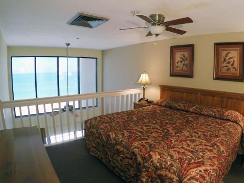 Island Gulf Resort, a VRI resort客房内的一张或多张床位