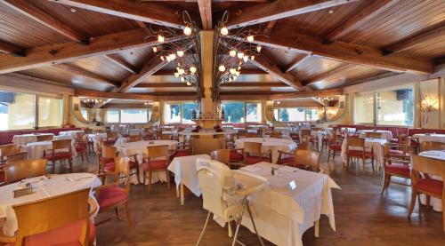 TH Madonna di Campiglio | Golf Hotel餐厅或其他用餐的地方
