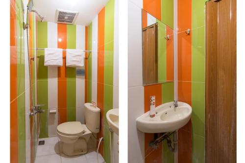 棉兰Capital O 615 Residence Puri Hotel Syariah的一间带卫生间和水槽的浴室