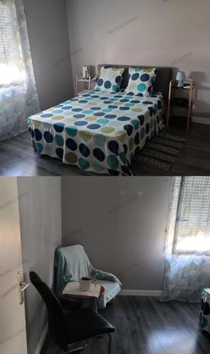 阿纳齐Maison au calme a Arnage的一间卧室配有一张床、一把椅子和一张桌子