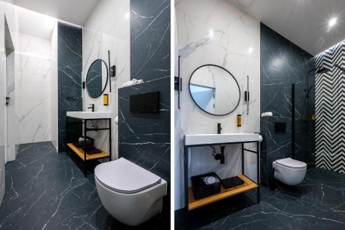 普热梅希尔Apartamenty Poniatowskiego的一间带卫生间、水槽和镜子的浴室