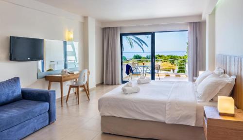 卡纳里奥洛里安西罗克斯尼亚酒店的酒店客房设有一张床,享有海景。