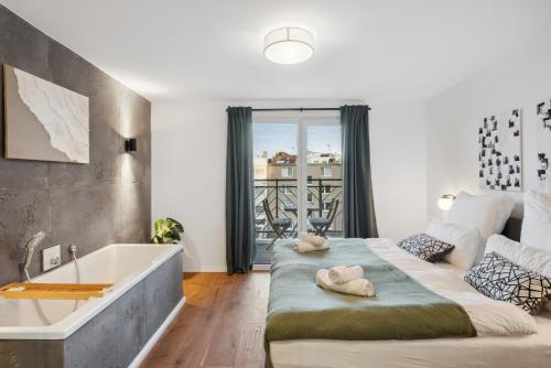波鸿Design-Apartment - Bochum Zentrum - 2 Balkons - Wanne - 118m2 - Netflix的一间带大床和浴缸的浴室