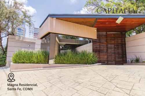 墨西哥城Capitalia - Apartments - Santa Fe的城市中带凉亭的建筑